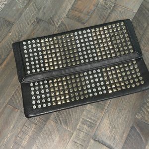 Black studded clutch